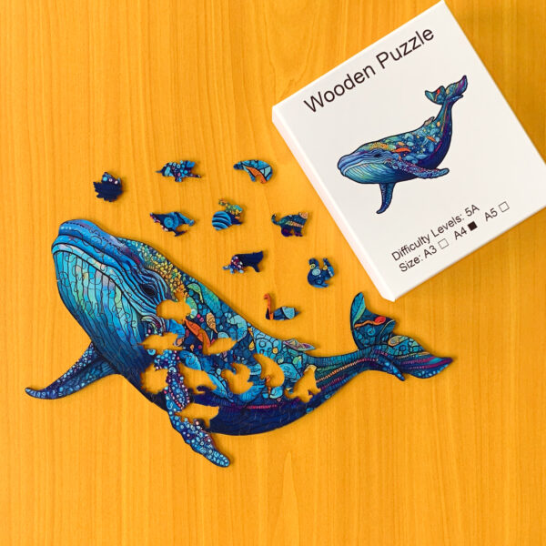 Zachwycający błękitny wieloryb - Drewniane puzzle - obrazek 1